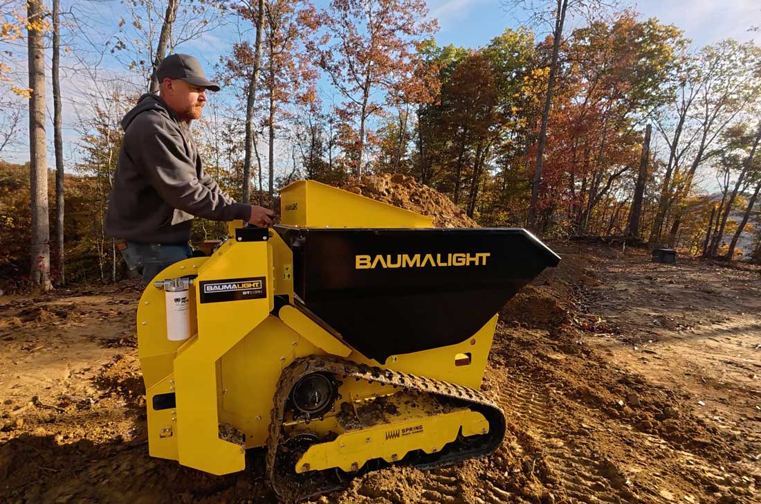 Baumalight tracked mini dumper unloading material