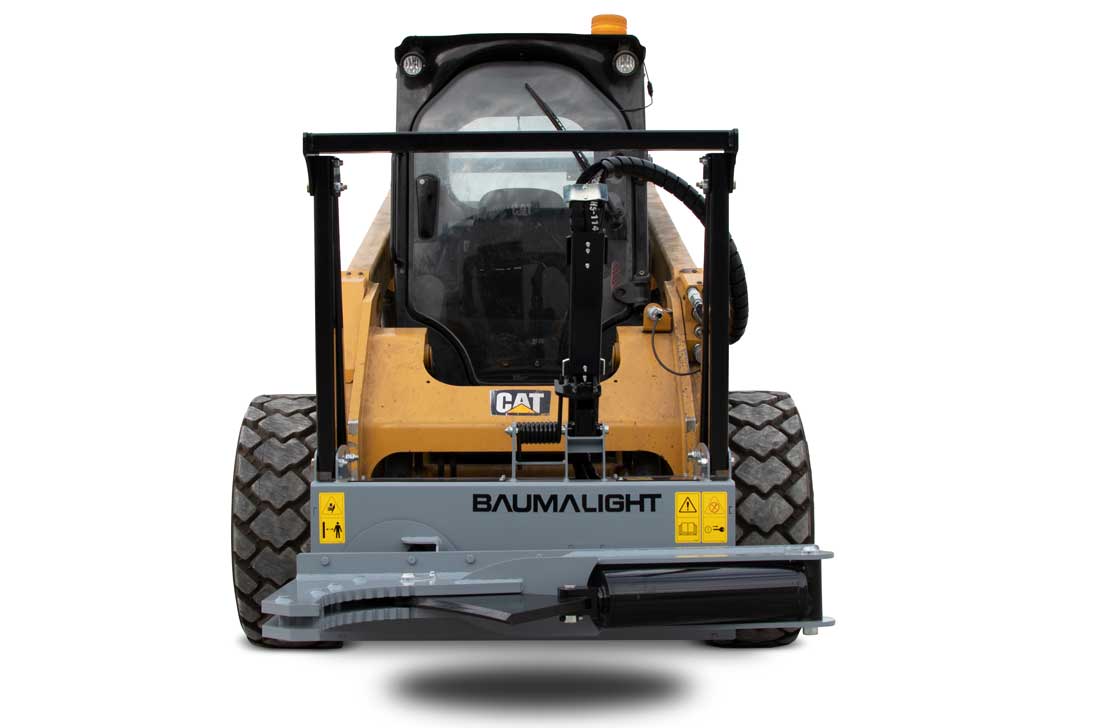 Baumalight ISR512 tree shear — ISR512 treeshear on CAT wheeled skidsteer