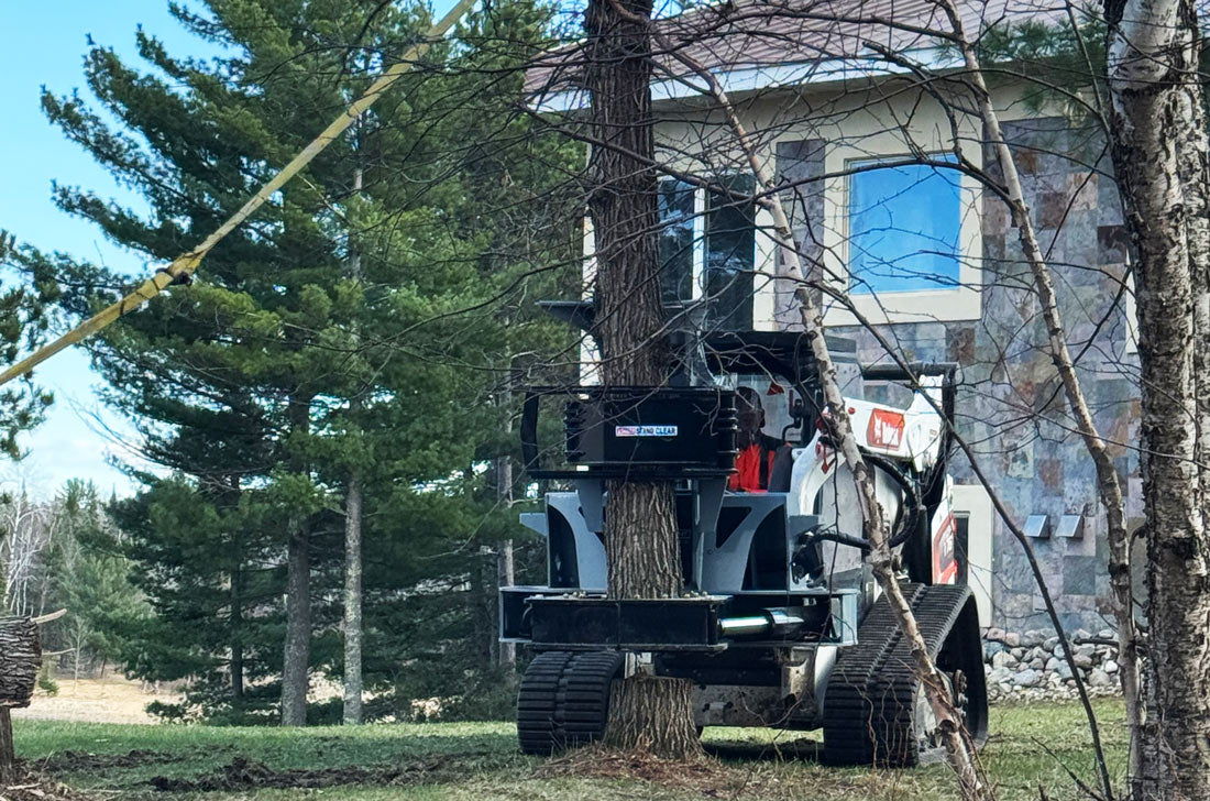 Baumalight ISH918G tree shear — ish918g skidsteer tree shear in action
