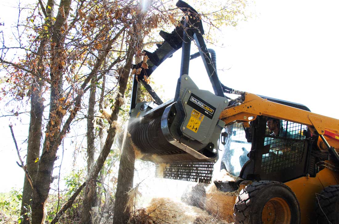 Baumalight MS1472 brush mulcher mounted on a skid steer