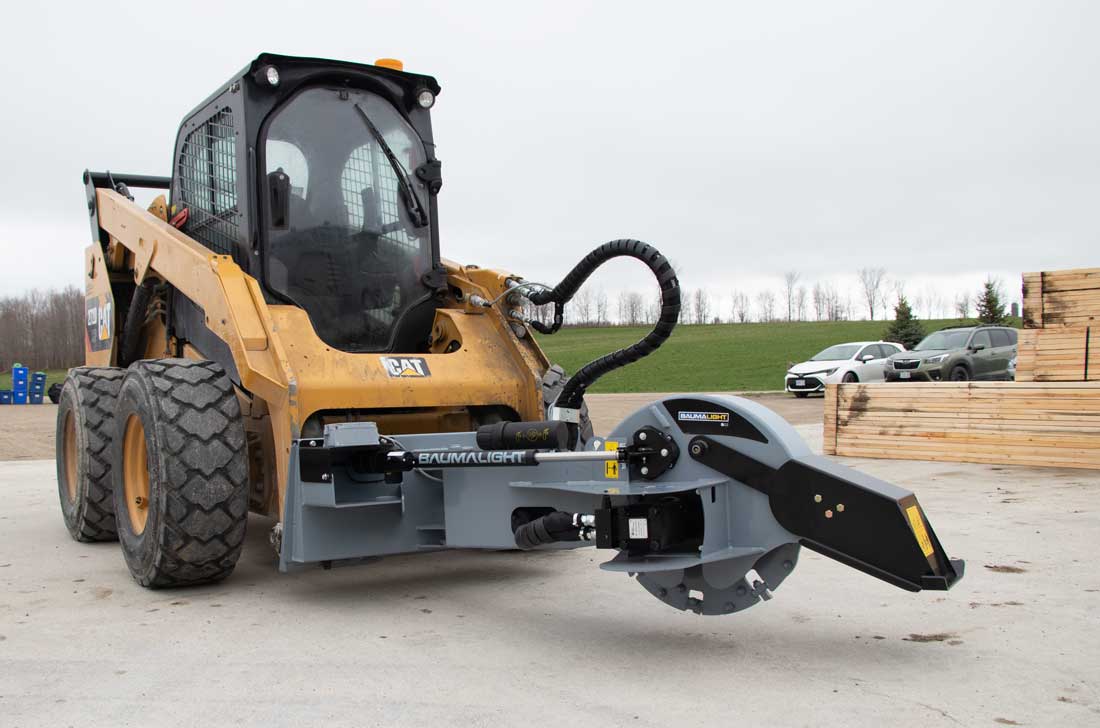 Baumalight S22 mounted on skid steer front view