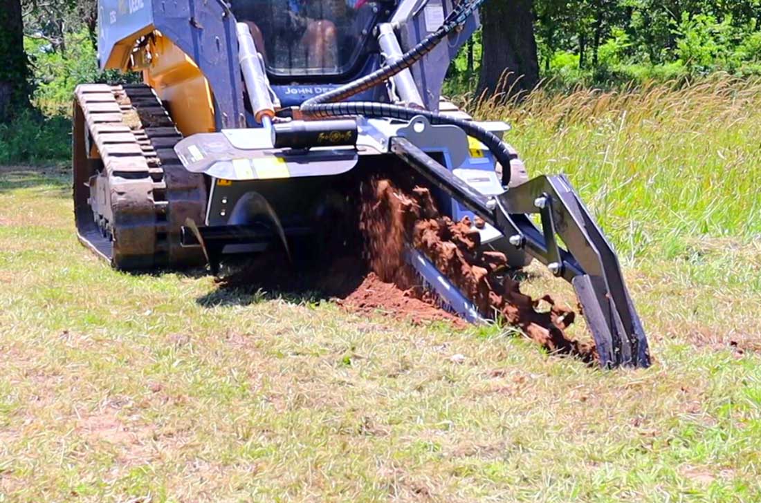 tn548 mounted on john deere skidsteer
